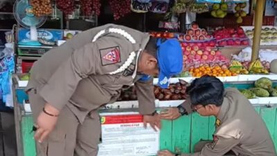 Satpol PP Kota Palangka Raya Tertibkan PKL di Atas Drainase