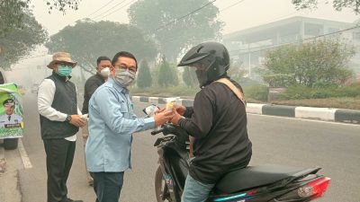 Pemko Palangka Raya Gencar Bagikan 5.000 Masker dan Susu